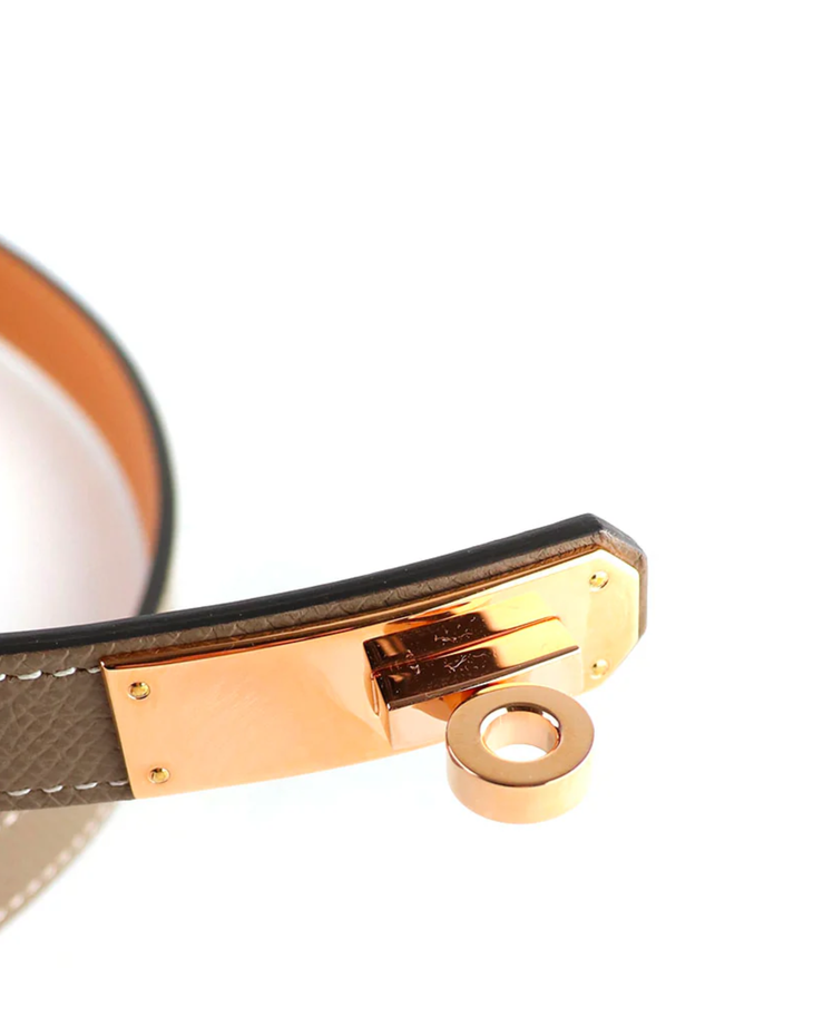 Hermes Kelly 18 belt in taupe leather with gold-toned buckle closure — Hermes | Endless UAE