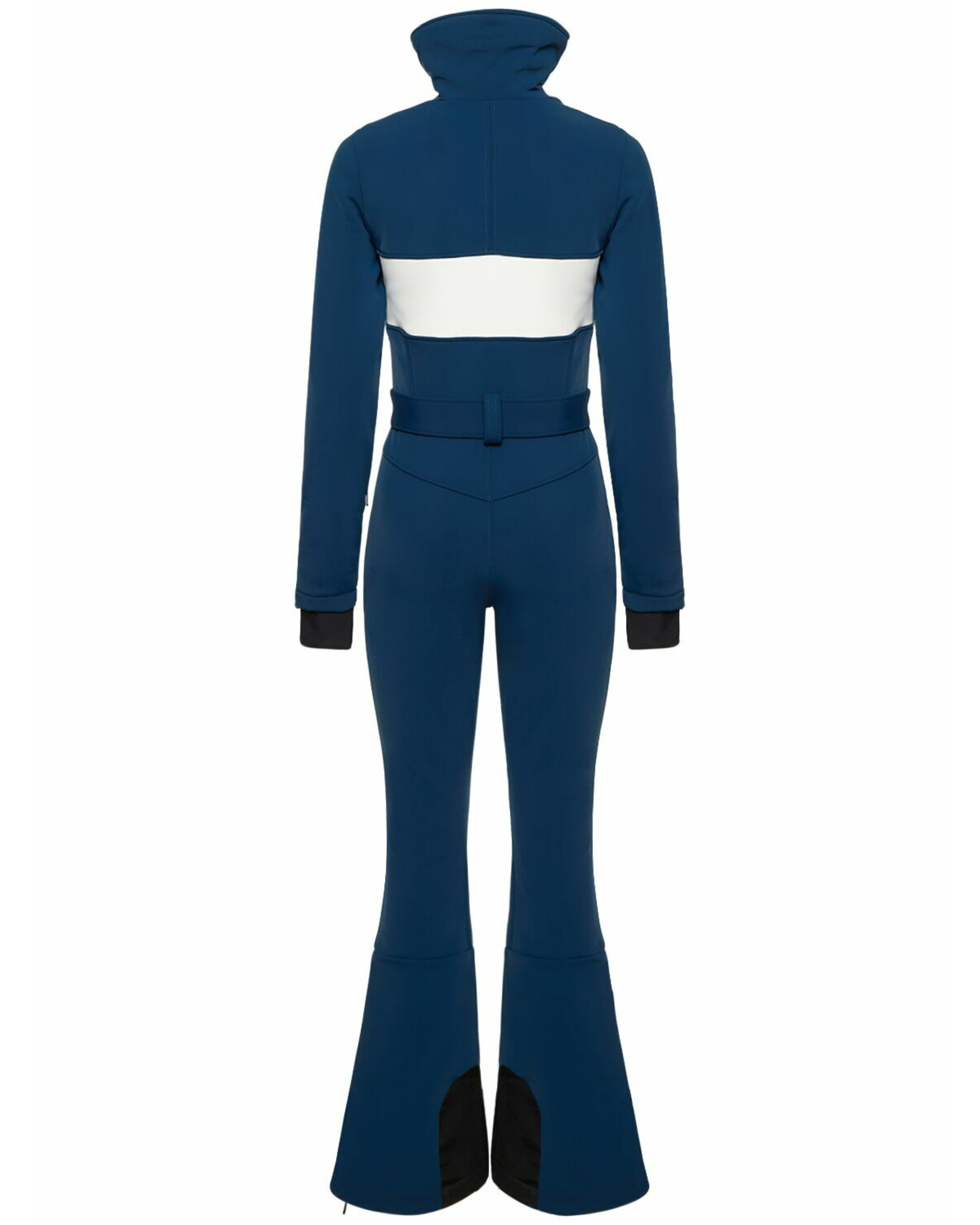 Woman wearing navy and white colorblocked ski jumpsuit with belt and black boots — Cordova | Endless UAE