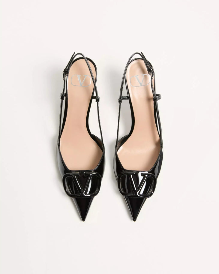 Black patent leather pointed-toe slingback pumps with VLogo hardware detail — Valentino Garavani | Endless UAE