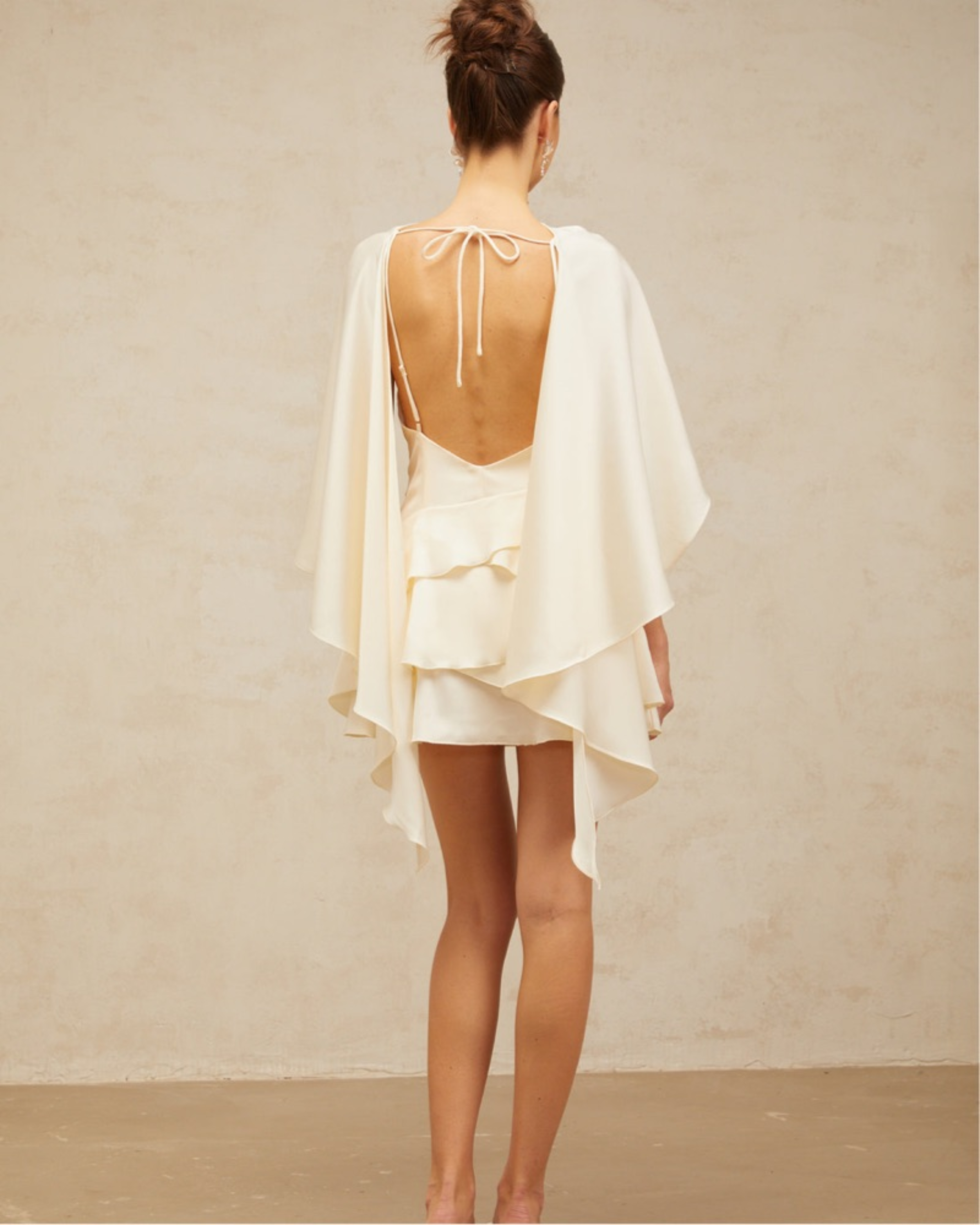 Lyna White Satin Dress with draped cape overlay and tiered skirt — Miss Rosier | Endless UAE