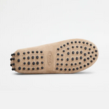 Beige suede junior driving loafer with black rubber sole and stitched detailing — Tod's | Endless UAE