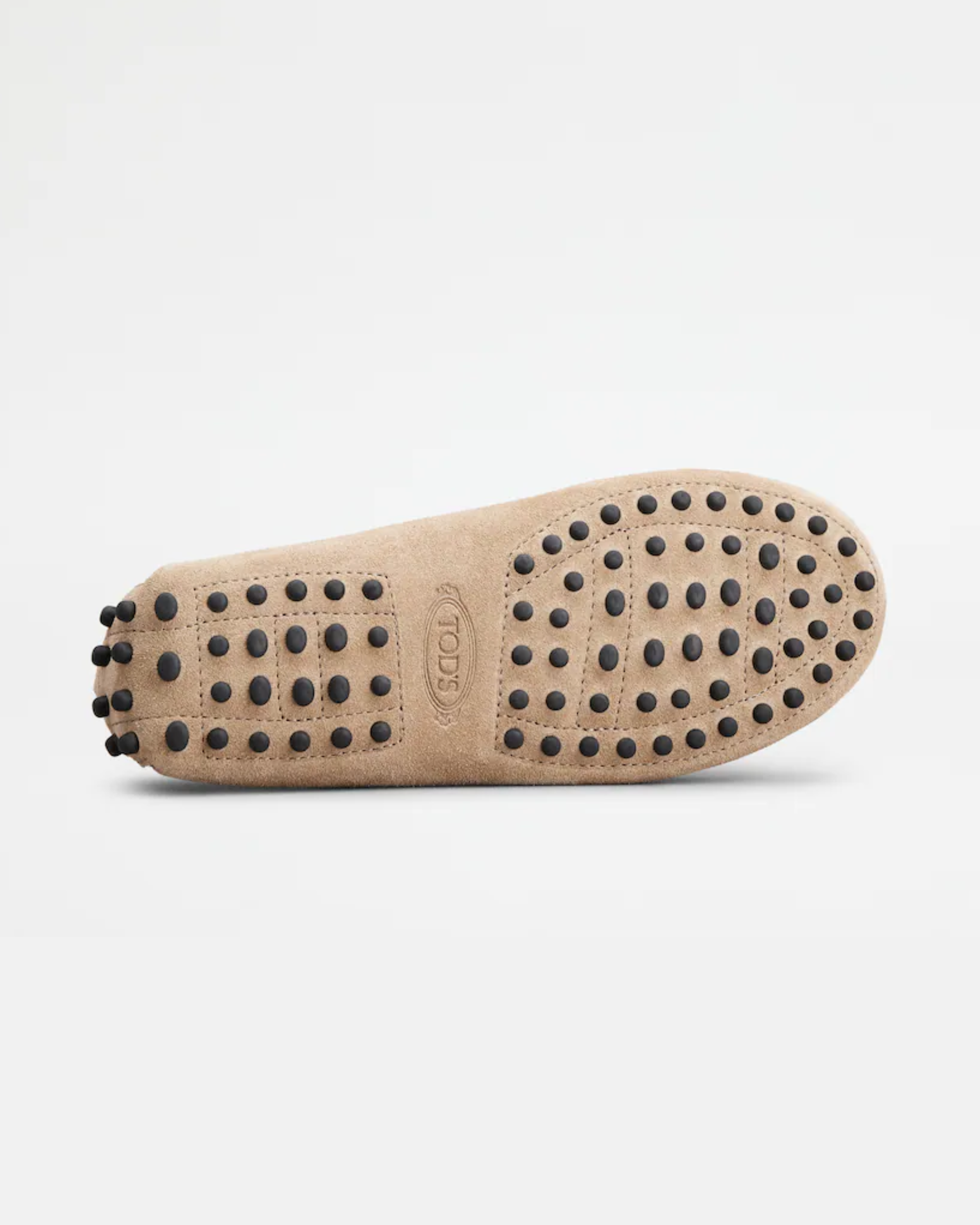 Beige suede junior driving loafer with black rubber sole and stitched detailing — Tod's | Endless UAE