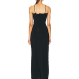 Black maxi dress with spaghetti straps and back tie detail, shown from behind — Mygel Coronel | Endless UAE