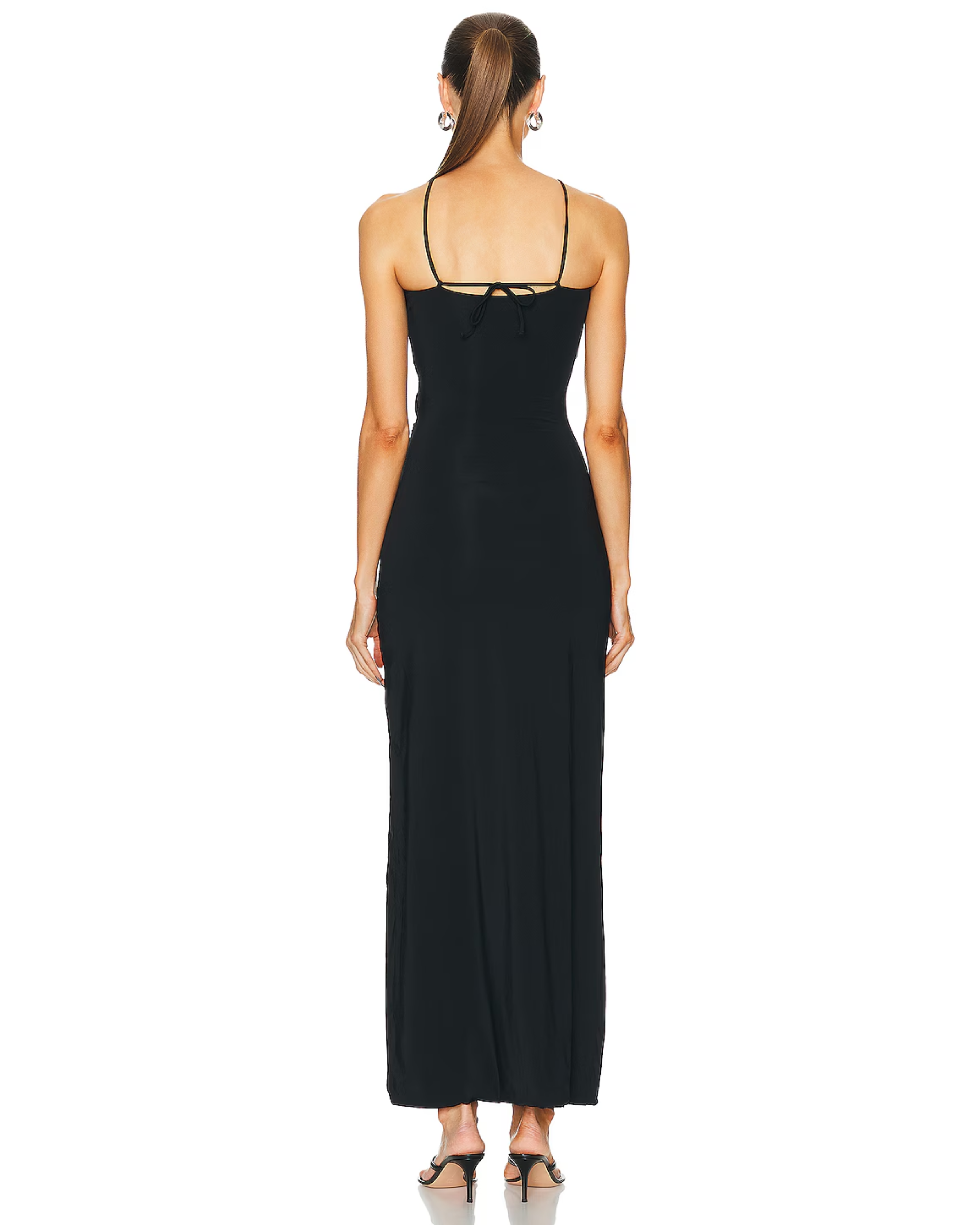 Black maxi dress with spaghetti straps and back tie detail, shown from behind — Mygel Coronel | Endless UAE