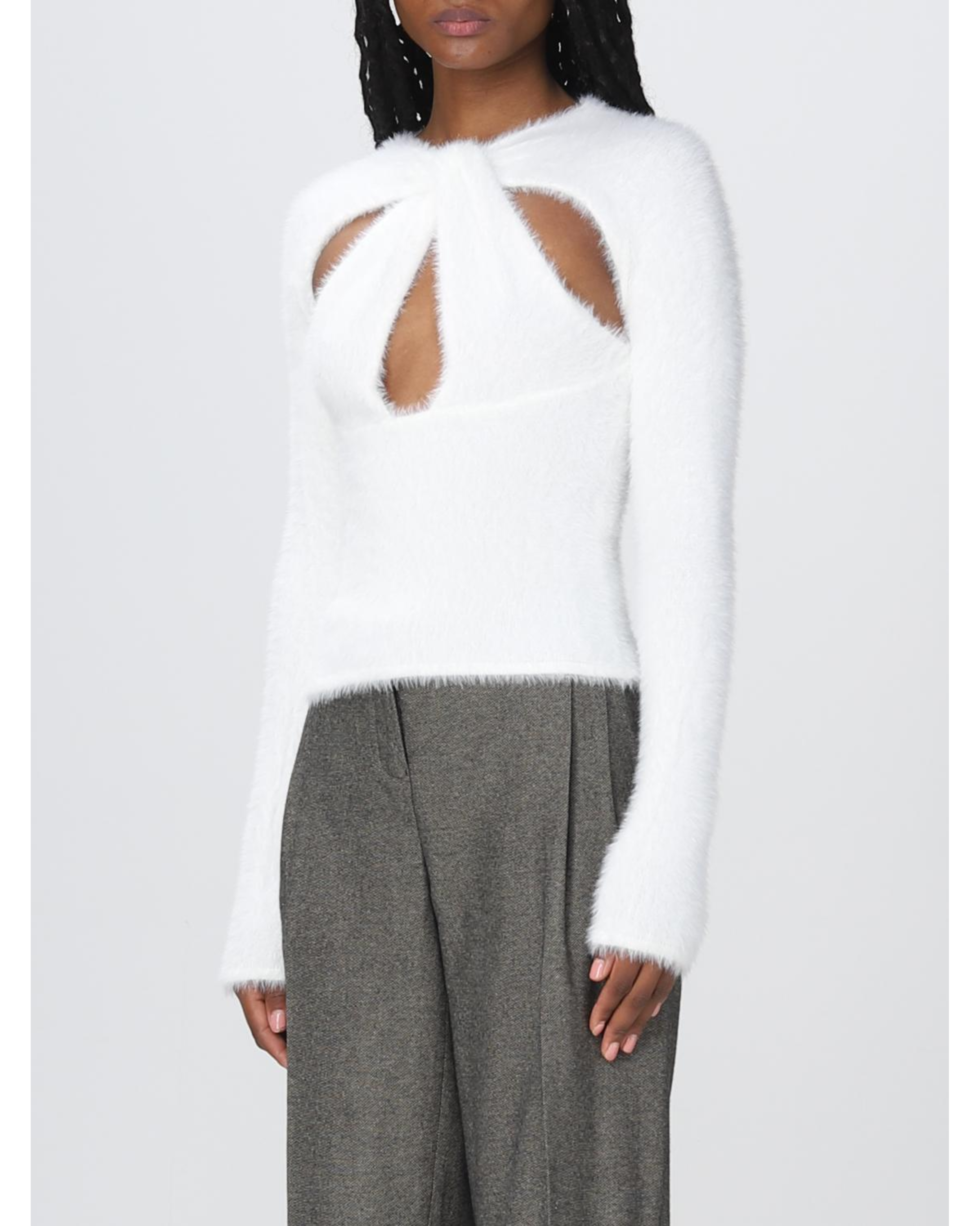 White fuzzy sweater with sculptural cutout detail at chest paired with gray wide-leg trousers — Coperni | Endless UAE