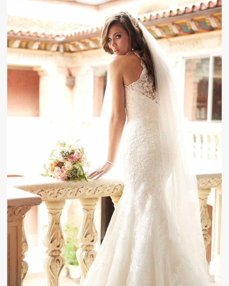 Elegant one-shoulder lace mermaid wedding gown with veil and floral bouquet — Allure Romance | Endless UAE