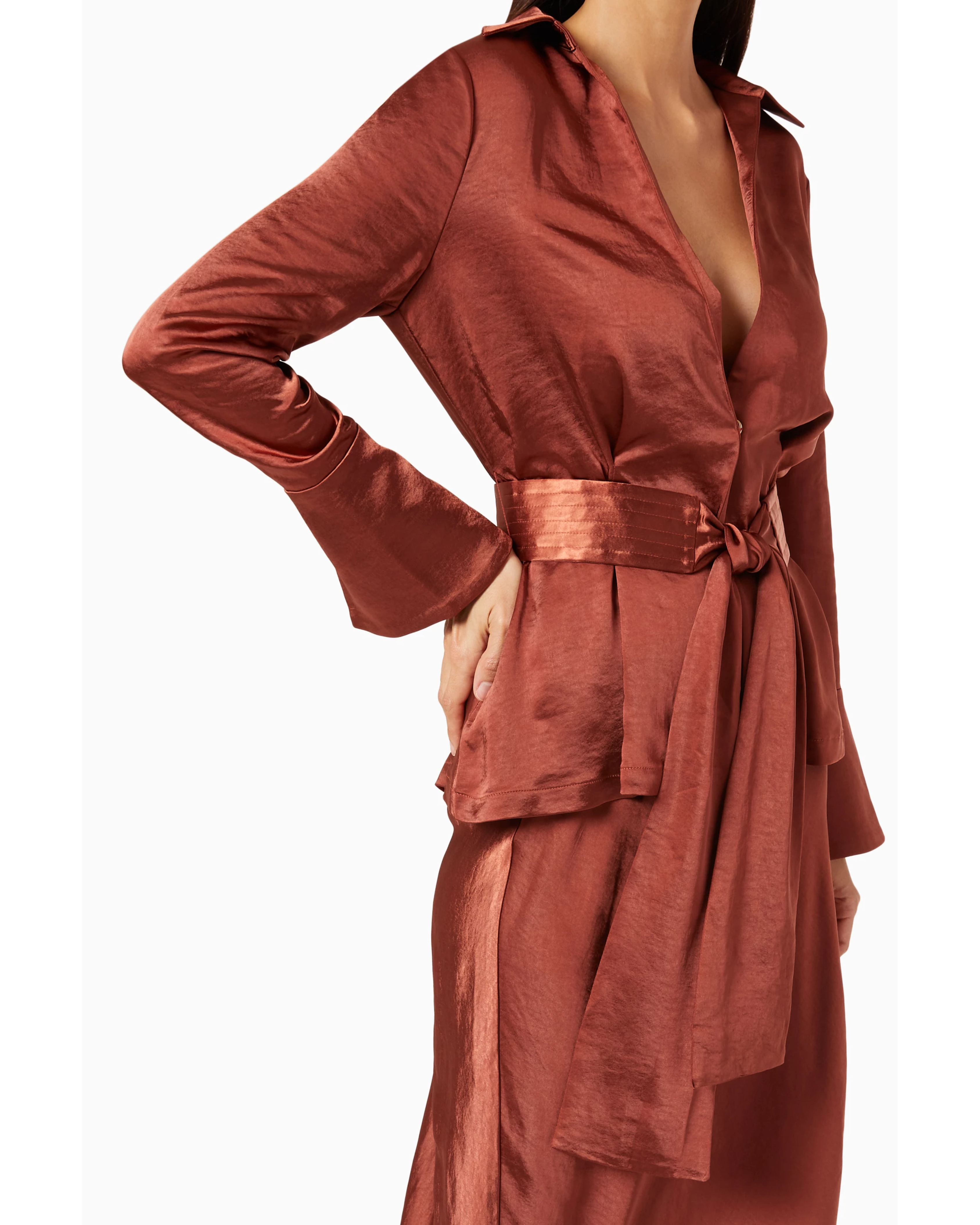 Rust-colored satin wrap top with long sleeves, collar detail, and matching waist tie belt — Significant Other | Endless UAE