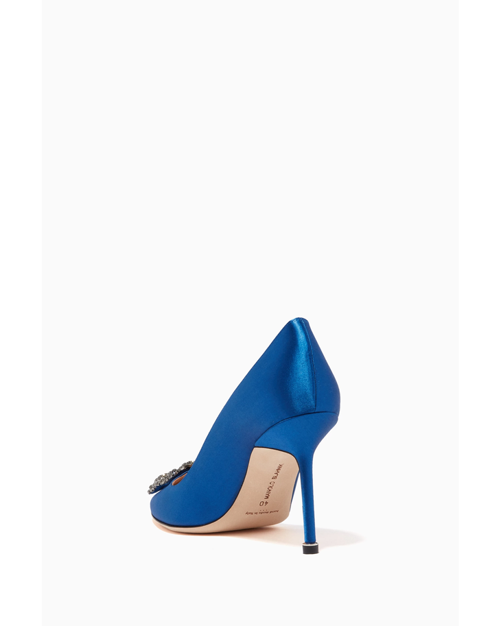 Blue satin pointed-toe pumps with crystal-embellished buckle and 90mm stiletto heel, shown from back side angle — Manolo Blahnik | Endless UAE