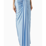 Woman wearing light blue Giselle Maxi Dress with cutout details and white handbag — Baobab | Endless UAE