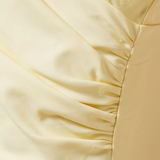 Cream draped cowl mini dress with sleeveless design and fitted silhouette — Shona Joy | Endless UAE