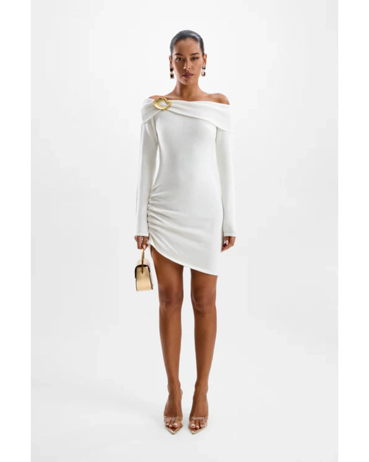 Woman in white off-shoulder long-sleeve knit dress with gold accents and matching accessories — Cin Cin | Endless UAE