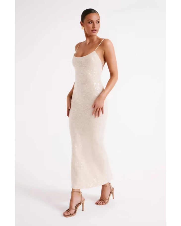 Woman wearing cream sequin maxi dress with thin straps and ankle length — Meshki | Endless UAE