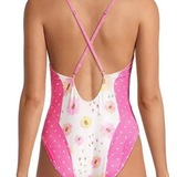 Pink and white floral one piece swimsuit with polka dot side panels and crisscross back straps — LoveShackFancy | Endless UAE