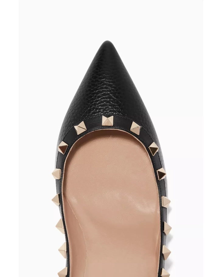 Black leather pointed-toe pumps with signature gold rockstud trim — Valentino Garavani | Endless UAE