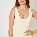 Cream sleeveless tennis dress with front pockets and scoop neckline — Odd Muse | Endless UAE
