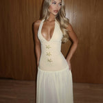 Elegant cream halter maxi dress with gold starfish embellishments and deep V-neckline — Vivienne Collection | Endless UAE