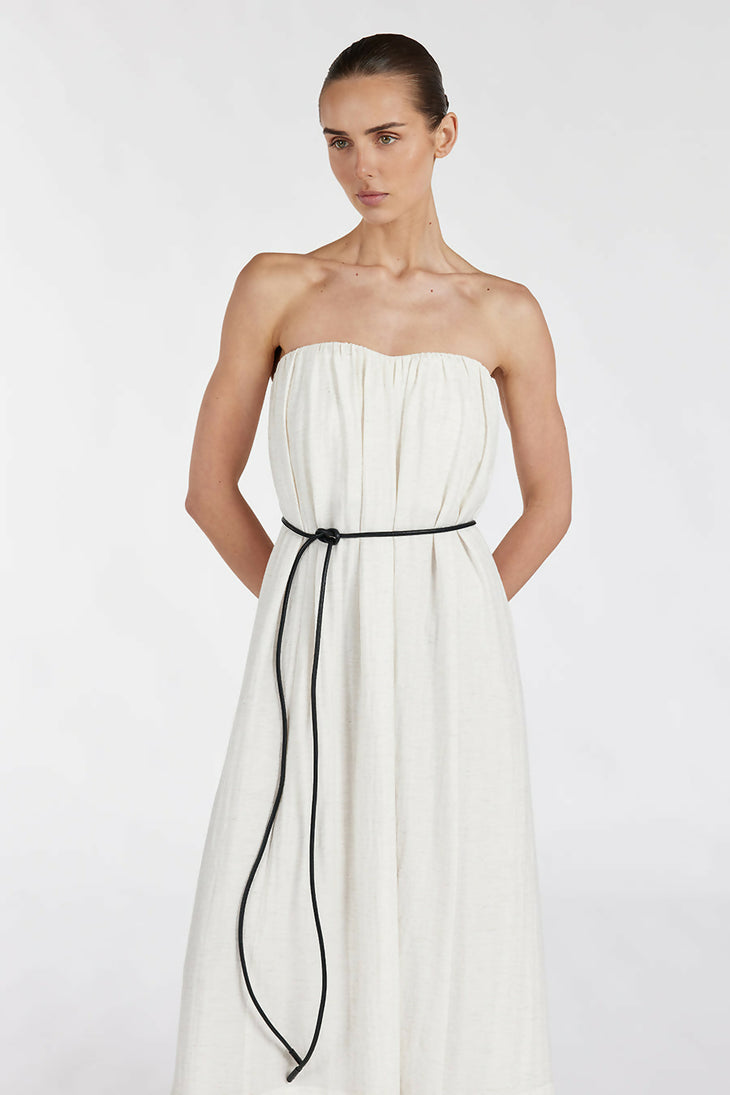 Elegant cream strapless midi dress with black tie belt and side pockets, featuring gathered bodice and flowing silhouette — Dissh | Endless UAE