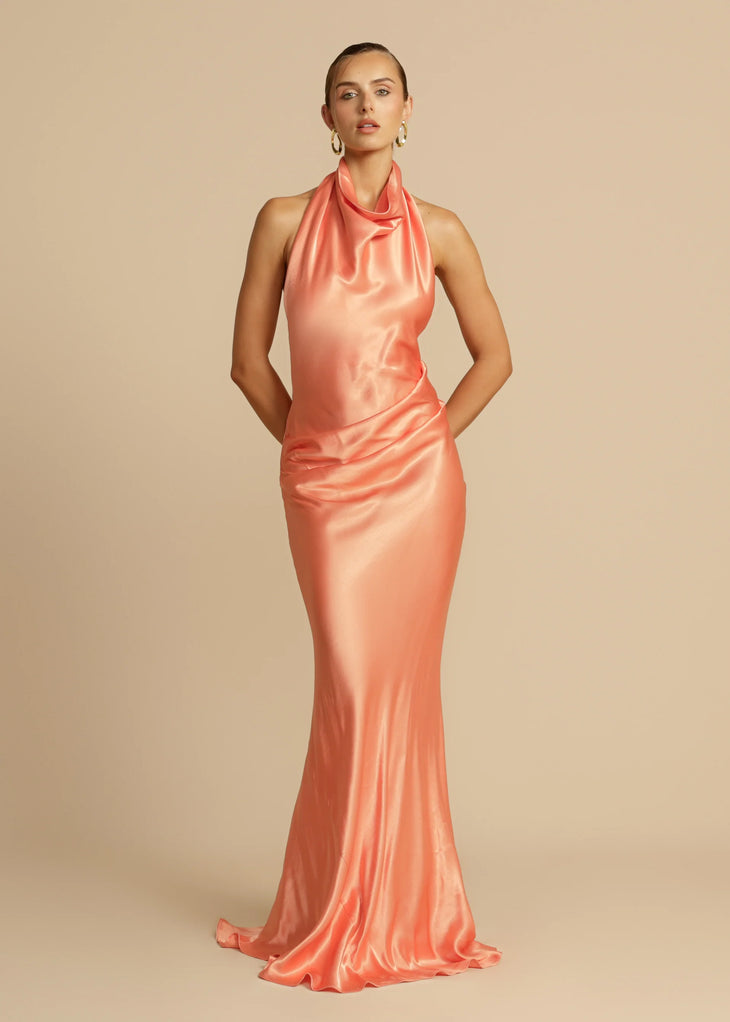 Elegant coral satin halter neck gown with cowl neckline and floor-length silhouette — Arcina Ori | Endless UAE