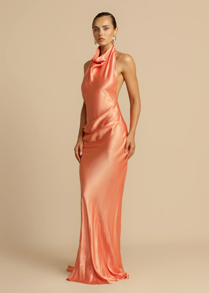 Elegant coral satin halter neck gown with cowl neckline and floor-length silhouette — Arcina Ori | Endless UAE