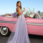 Lavender tulle ball gown with embellished bodice and flowing skirt, styled with pink vintage car — Catwalk Couture | Endless UAE