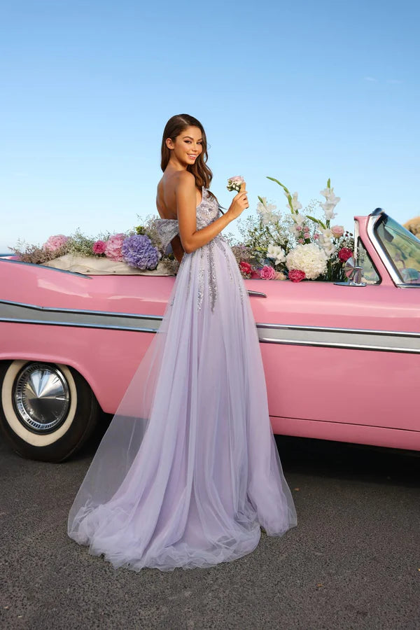 Lavender tulle ball gown with embellished bodice and flowing skirt, styled with pink vintage car — Catwalk Couture | Endless UAE