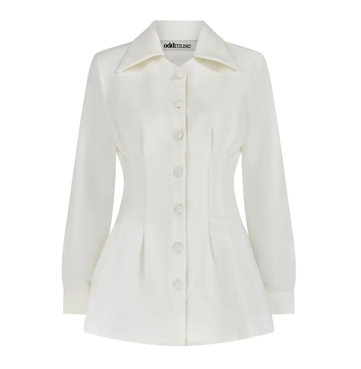 Tailored white button-up shirt with pointed collar and long sleeves in structured fabric — Odd Muse | Endless UAE