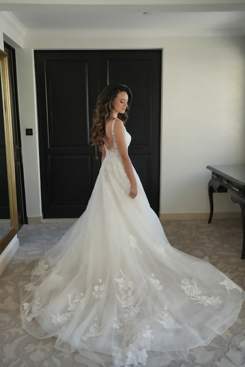 Elegant A-line wedding dress with floral lace appliqué train and illusion back — Rosa Clara | Endless UAE