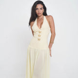 Elegant pale yellow halter maxi dress with starfish embellishments and plunging neckline — Vivienne Collection | Endless UAE