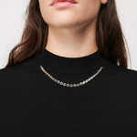 Black knit top with pink plaid wool skirt dress — Maje | Endless UAE