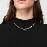 Black knit top with pink plaid wool skirt dress — Maje | Endless UAE