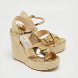 Gold metallic espadrille wedge sandals with crisscross straps and ankle buckle on beige jute platform — Jimmy Choo | Endless UAE