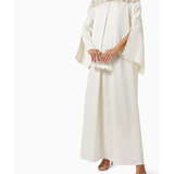 Elegant ivory maxi dress with lace yoke detail and dramatic wide cape sleeves — Nass | Endless UAE