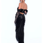 Black velvet off-shoulder gown with lace detailing and corset bodice, featuring draped skirt and cutout back — Miss Circle | Endless UAE.