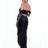 Black velvet off-shoulder gown with lace detailing and corset bodice, featuring draped skirt and cutout back — Miss Circle | Endless UAE.