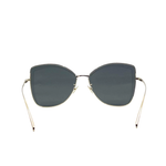 Gold cat-eye sunglasses with dark gray lenses and thin metal frames — Chanel | Endless UAE