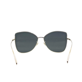 Gold cat-eye sunglasses with dark gray lenses and thin metal frames — Chanel | Endless UAE