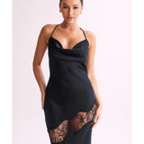 Woman wearing black satin maxi dress with lace side detail and halter neckline — Meshki | Endless UAE