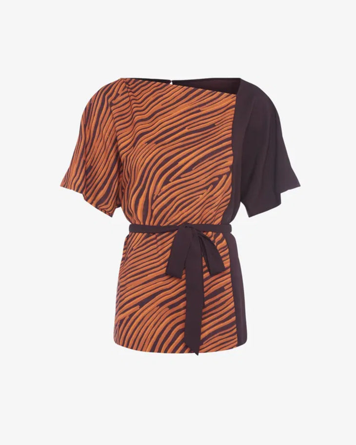 Woman wearing orange zebra stripe top with black sleeves and black cropped pants — French Connection | Endless UAE
