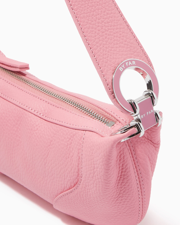 Pink leather mini shoulder bag with dual handles displayed against neutral background — By Far | Endless UAE