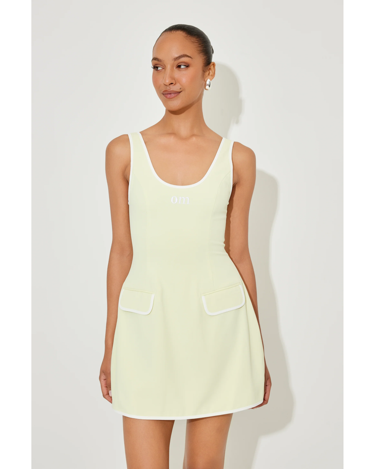 Cream sleeveless tennis dress with front pockets and scoop neckline — Odd Muse | Endless UAE