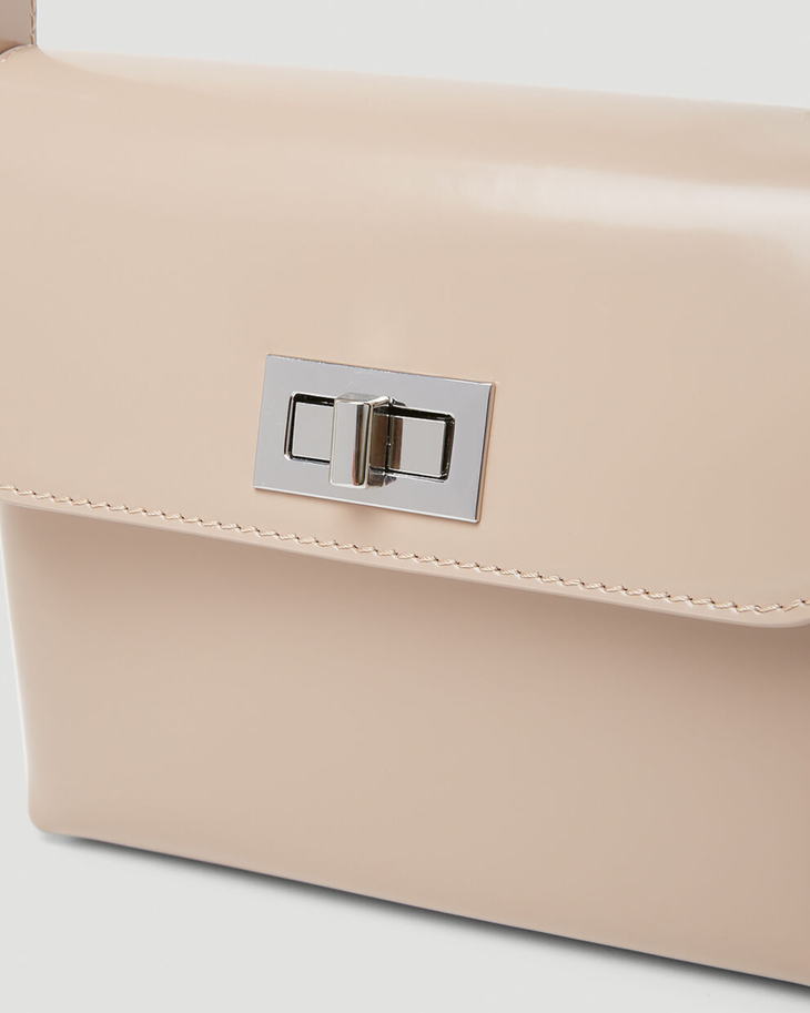 Beige patent leather shoulder bag with dual compartments and silver turnlock closures — Endless | Endless UAE