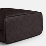 Black leather tote bag with dual handles and Coach branding — Coach | Endless UAE