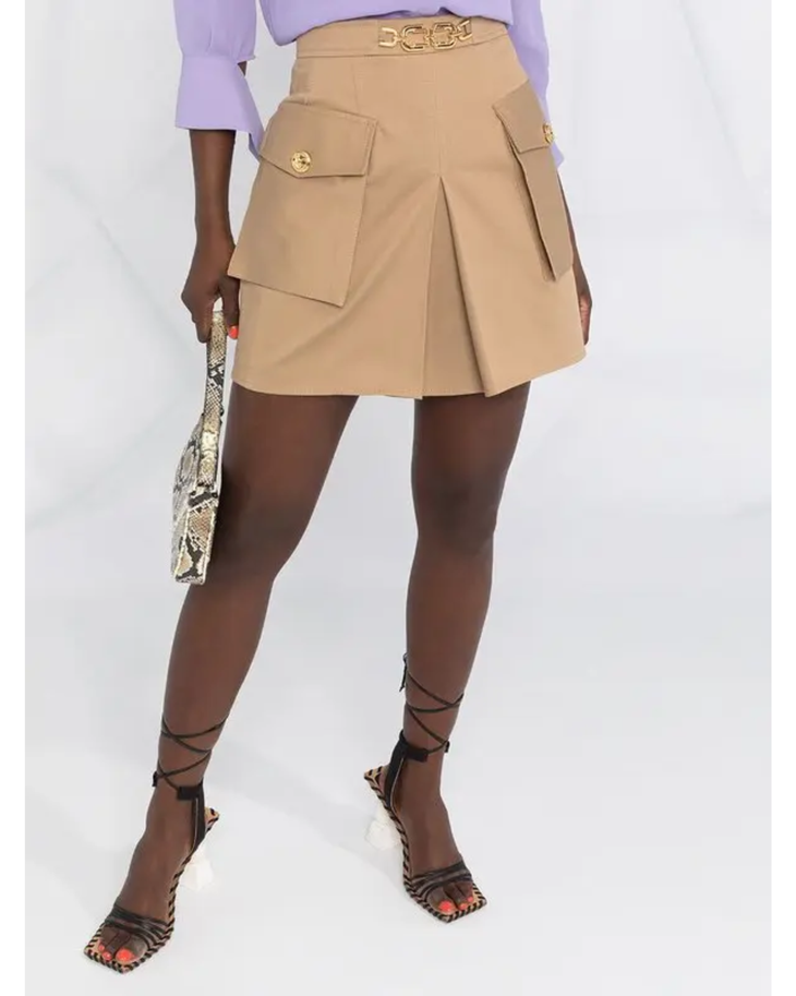 Beige cotton mini skirt with gold logo plaque at waist, cargo pockets with button details, and pleated hem — Elisabetta Franchi | Endless UAE