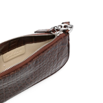 Dark brown croc-embossed mini shoulder bag with chain detail held in hand — By Far | Endless UAE