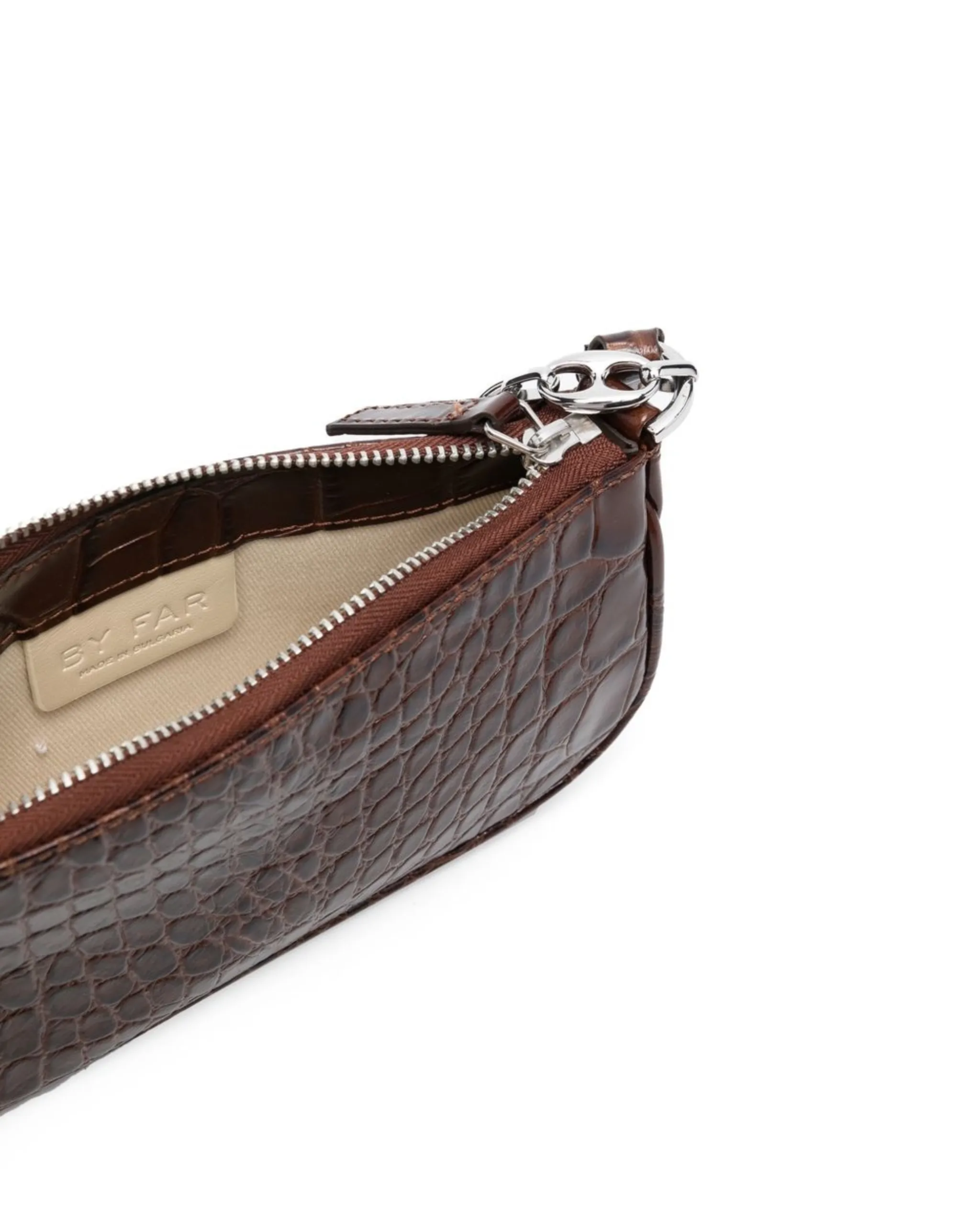 Dark brown croc-embossed mini shoulder bag with chain detail held in hand — By Far | Endless UAE