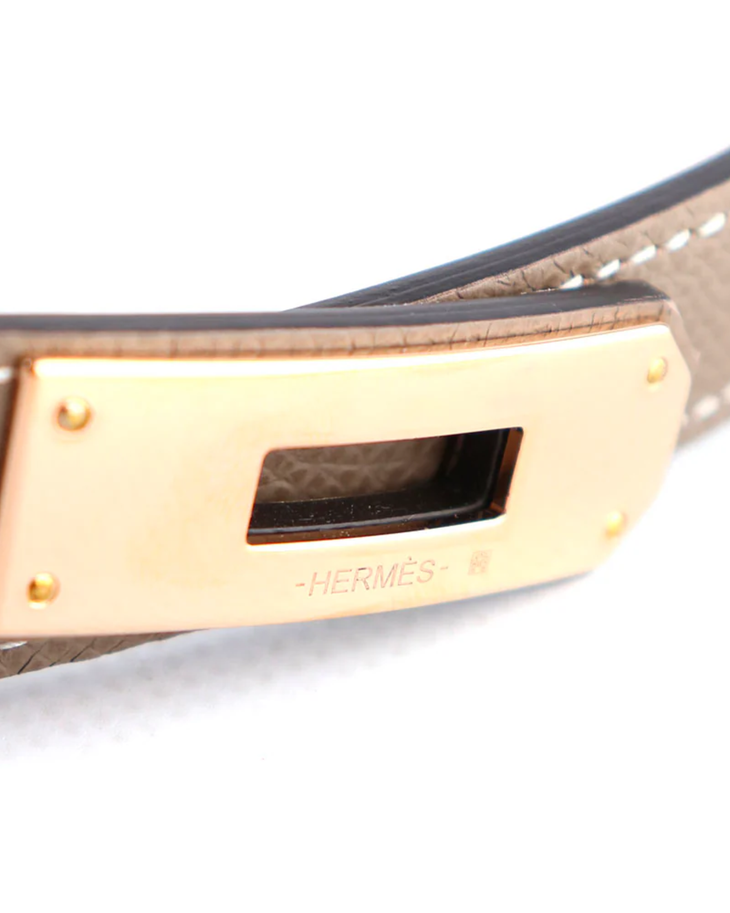 Hermes Kelly 18 belt in taupe leather with gold-toned buckle closure — Hermes | Endless UAE