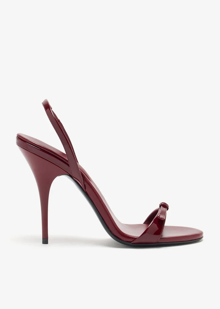 Burgundy patent leather sandal with thin straps and high stiletto heel — Miu Miu | Endless UAE