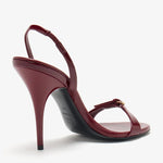 Burgundy patent leather sandal with thin straps and high stiletto heel — Miu Miu | Endless UAE