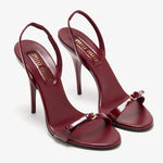 Burgundy patent leather sandal with thin straps and high stiletto heel — Miu Miu | Endless UAE