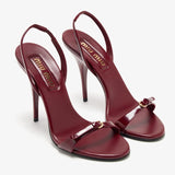 Burgundy patent leather sandal with thin straps and high stiletto heel — Miu Miu | Endless UAE